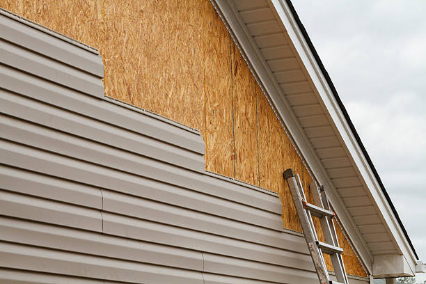 Professional Vinyl Siding technician working in Claremont, NC